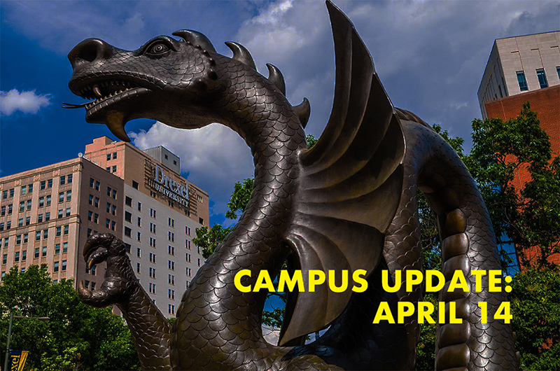 Dragon statue with the words campus update April 14